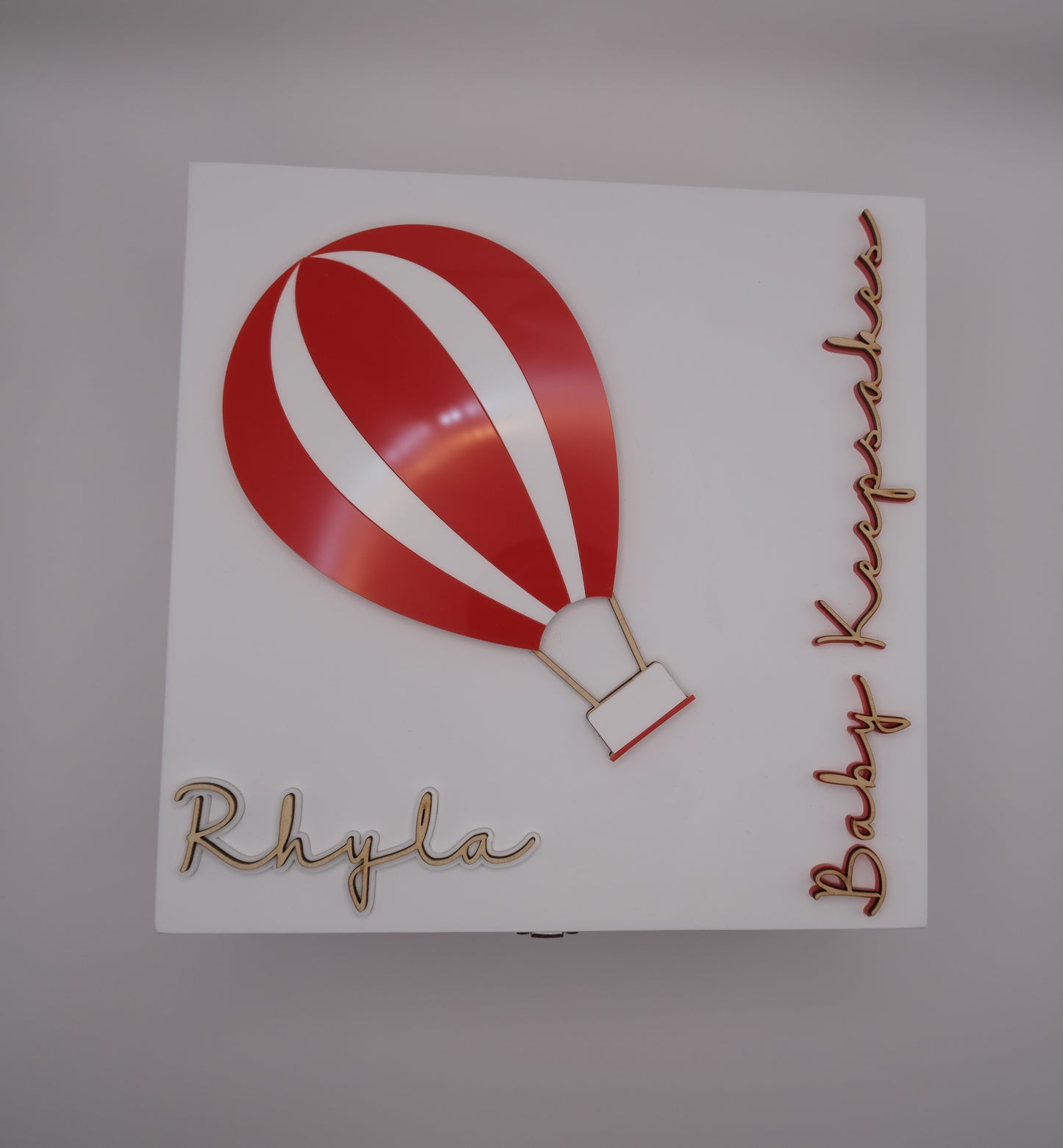 Baby Keepsake box with red and white hot air balloon and text on a white background