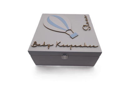 White baby keepsake box with hot air balloon design and 'Baby Keepsake' text on a white background